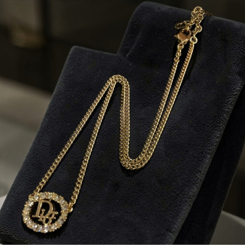 Christian Dior Gold-Tone and Rhinestone Circular Logo Necklace