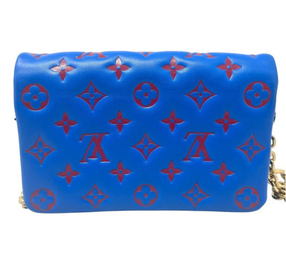 Louis Vuitton Blue/Red Embossed Monogram Pochette Coussin